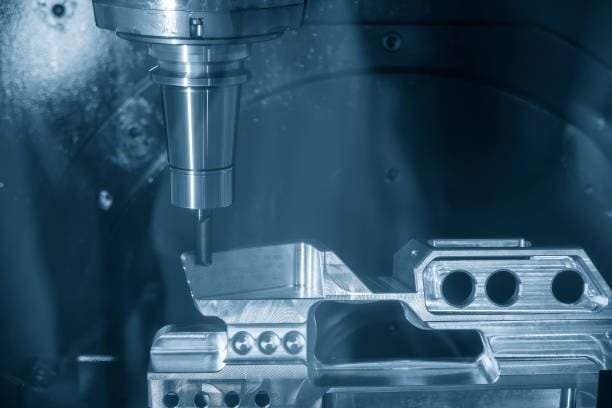 Close-up shot of a CNC machine milling an aluminum workpiece with high precision, showing the cutting tool in action during the manufacturing process.