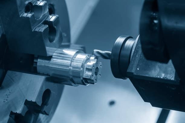 Close-up of a CNC turning machine cutting and shaping a metal workpiece, with precision tooling for fine detailing of mechanical parts.