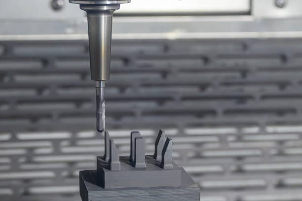 CNC milling machine cutting metal parts with precision tools, producing detailed shapes for mechanical components.