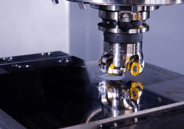 Face milling operation on metal surface for high-precision automotive CNC machining