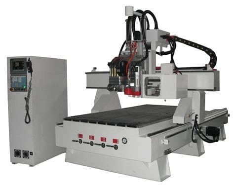 Industrial CNC router machine with gantry system and computerized control panel for precision machining.