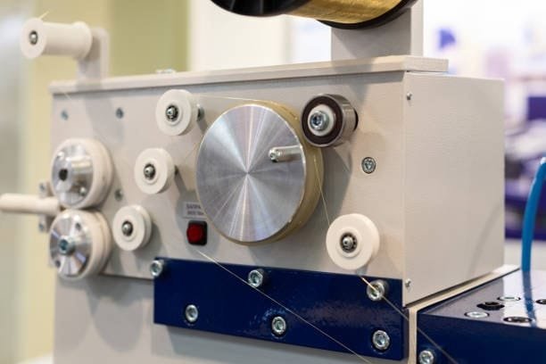 Wire guiding mechanism of an EDM wire cutting machine