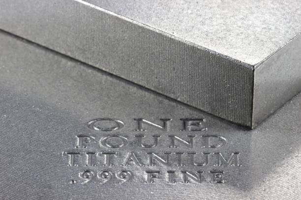 Close-up of a stamped one-pound titanium bar used in testing and manufacturing