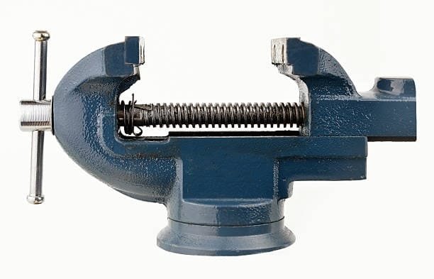 Steel bench vise used to clamp parts securely during CNC or manual processing