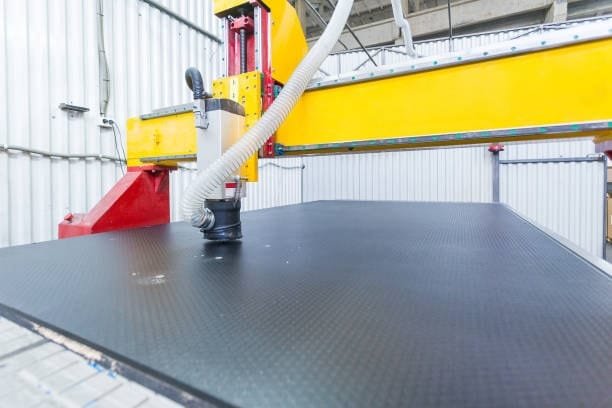 DIY CNC vacuum table with spoilboard and dust collection hose installed