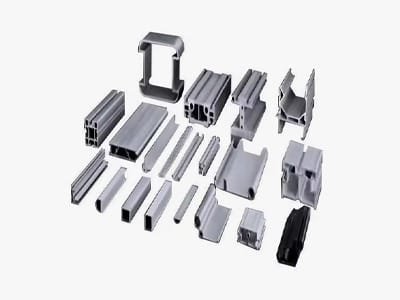 Assorted aluminum guide rails and extrusion profiles in various shapes and sizes
