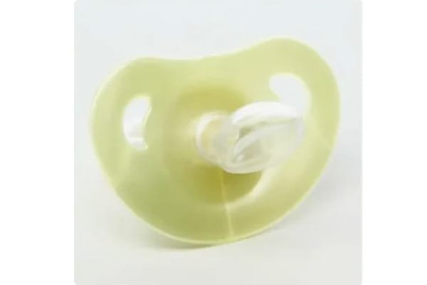 Yellow silicone rubber baby pacifier produced by injection molding