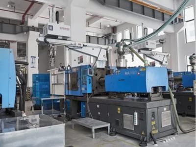 Injection molding machines in a modern manufacturing workshop used for rapid prototyping and production