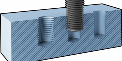 Diagram showing difference between threaded blind hole and through hole with a screw